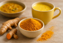 Kurkuma – właściwości zdrowotne i zastosowanie w kuchni Zmielona kurkuma, korzeń kurkumy oraz złote mleko na stole