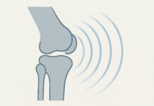 Ilustracja przedstawiająca staw kolanowy i symbolizujące rezonans magnetyczny fale
